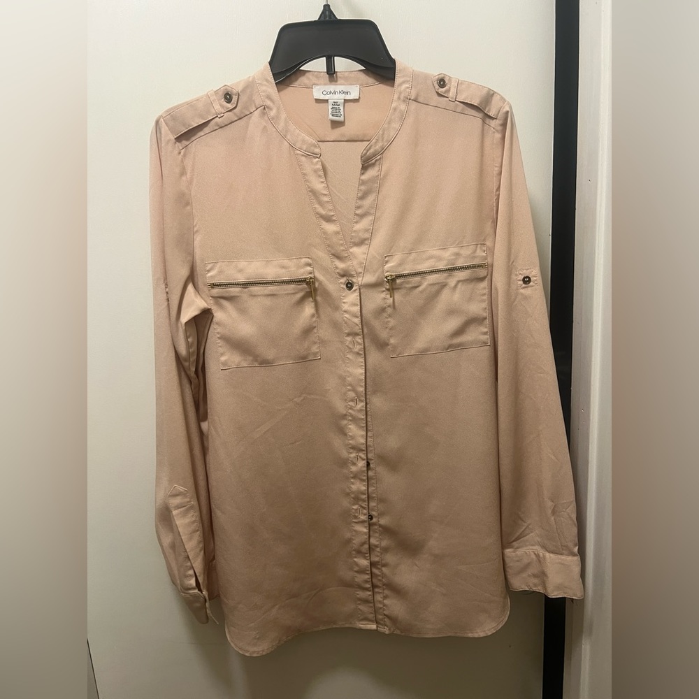 Light rose gold blouse cute for any event gently worn.